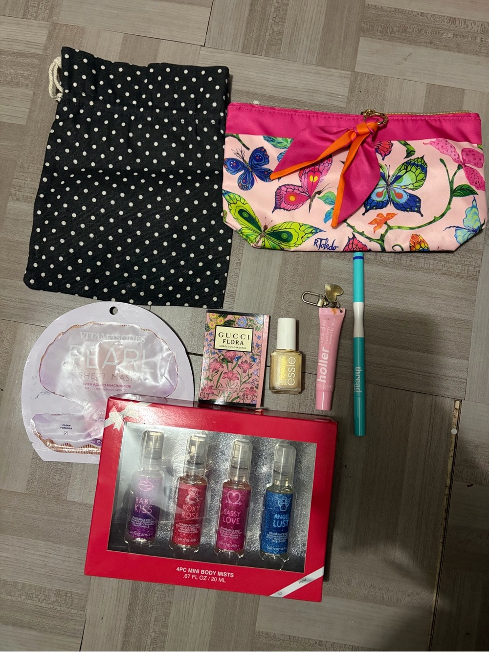 8 pcs ESTEE LAUDER  Butterfly  Makeup Bag with Gucci sample,lipgloss, sheet mask